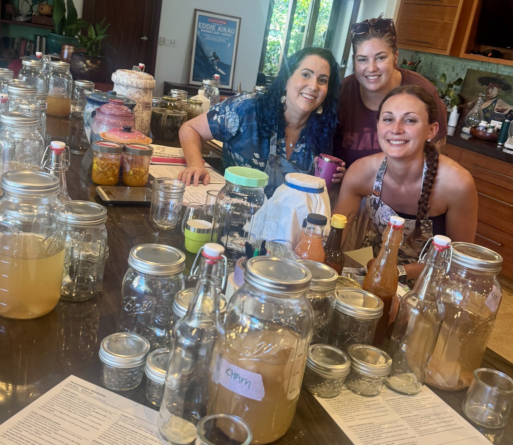 Allison and helpers showing their fermentation work