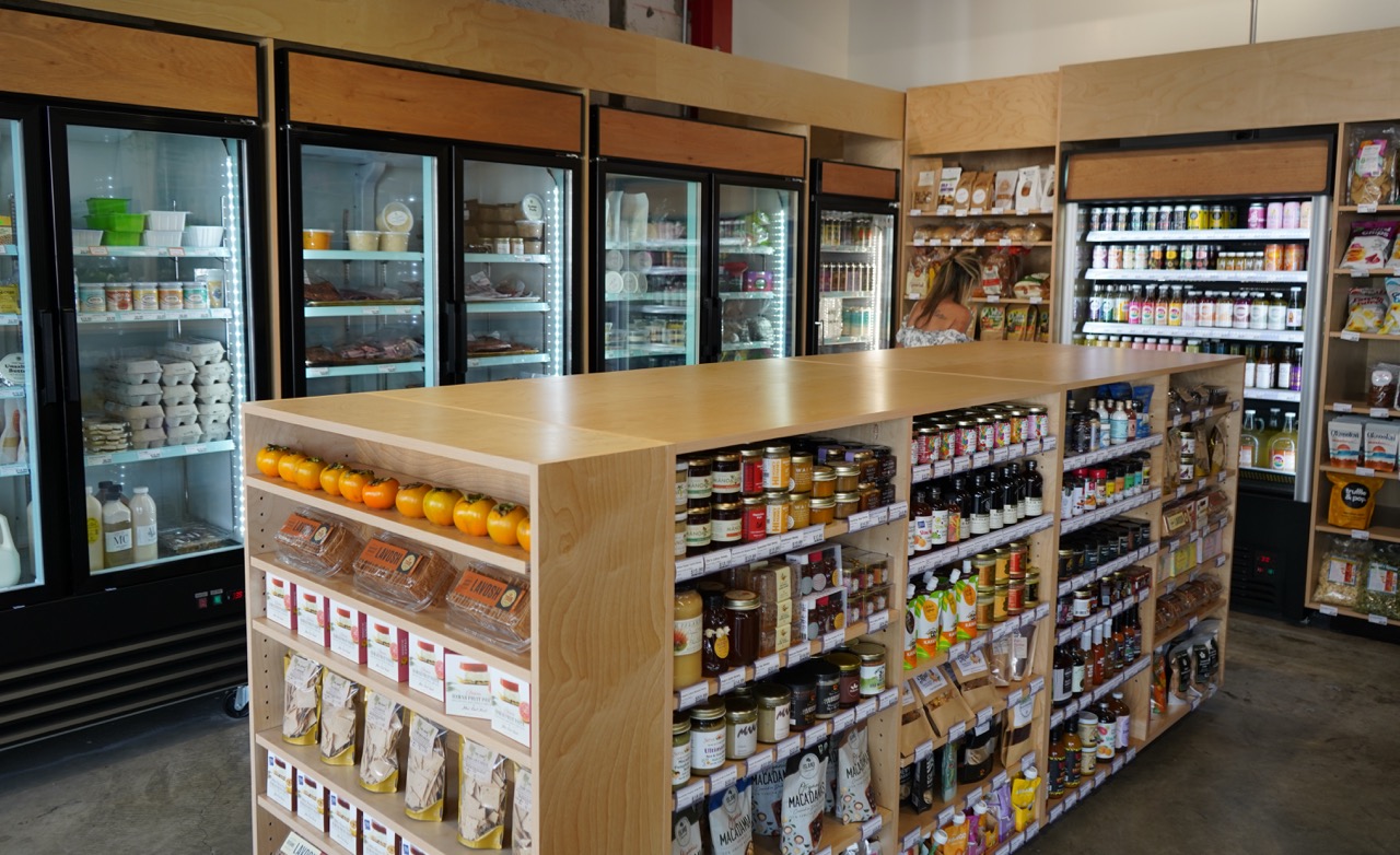Refrigerated and dry goods section at Hōʻiliʻili Market